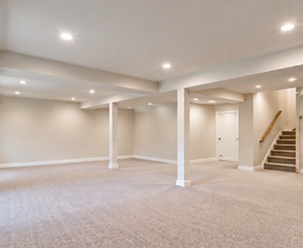 Finished basement with drywall walls and ceiling